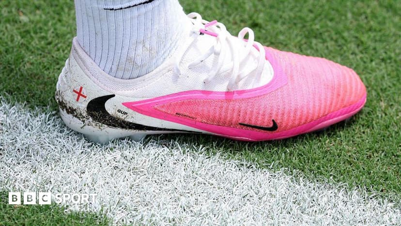 Why are footballers wearing pink boots at the World Cup?